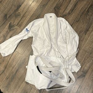 Never worn Gi but one dust mark.  See picture